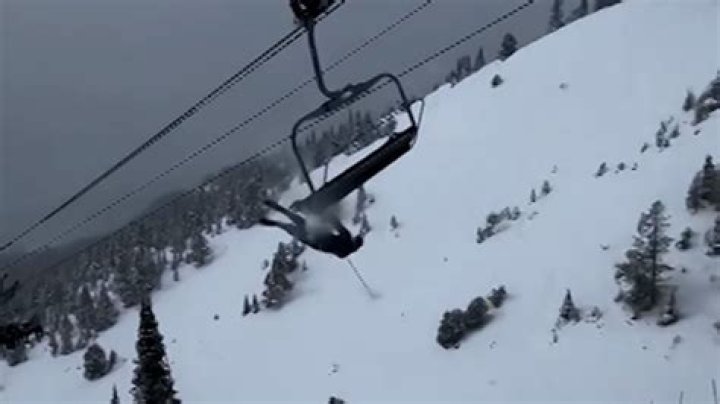 Gone Girl star hides her face after it was 'smashed up' from skiing accident