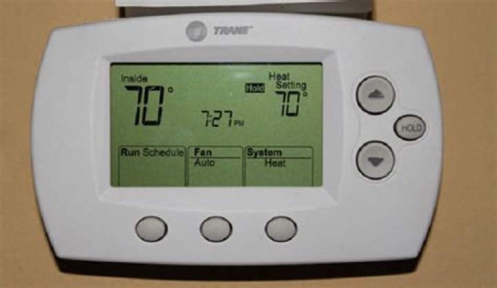 How do I lock my Trane thermostat?