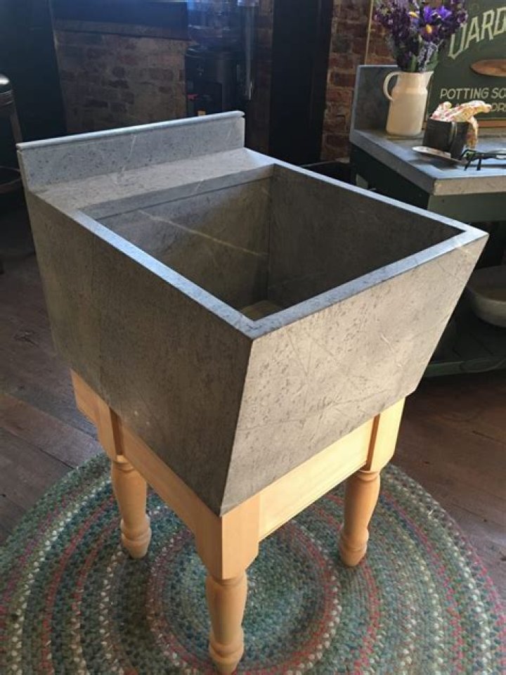 How do you clean a soapstone laundry sink?