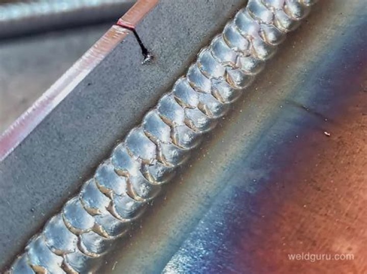 How do you stick weld vertical 7018?