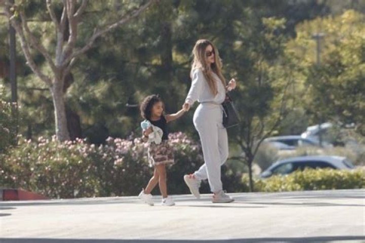 Khloe Kardashian steps out in LA: do her butt implants look proportional?