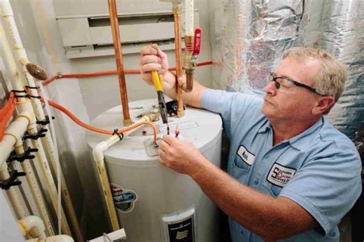 Why is my water pressure low after installing water heater?
